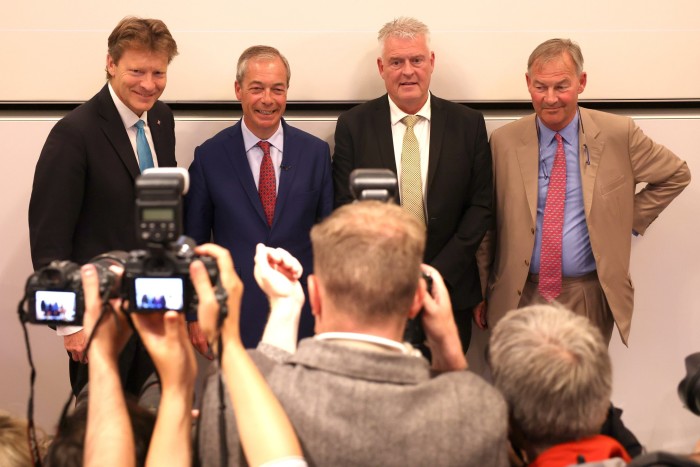 Reform’s deputy leader Richard Tice, Nigel Farage, Lee Anderson and Rupert Lowe pose for media last July