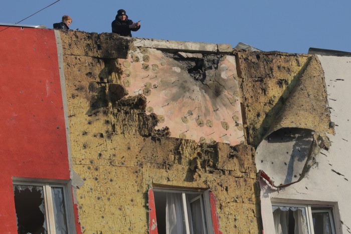A view of a damaged apartment building following a Ukrainian drone attack in Moscow, Russia