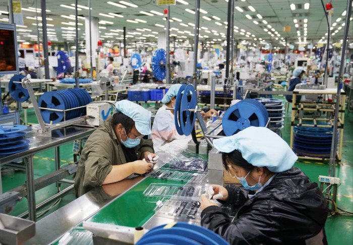 An employee at a Foxconn factory in Zhongmu county, Zhengzhou city, Henan Province of China