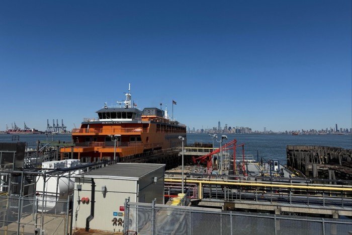 A ferry and Manhattan in the background as seen from Staten Island