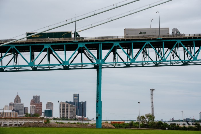 A view of Detroit and Windsor under the Ambassador Bridge
