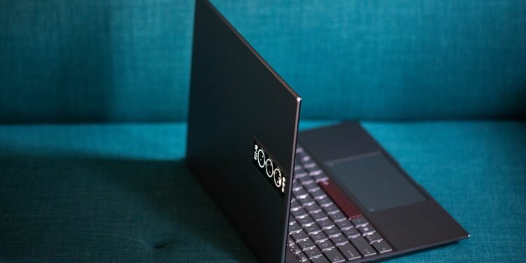 "Asus Zenbook 14 OLED Space Edition: Innovative Tiny OLED Display on Lid"